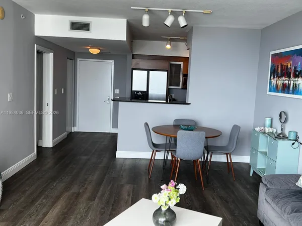 a living room with large windows