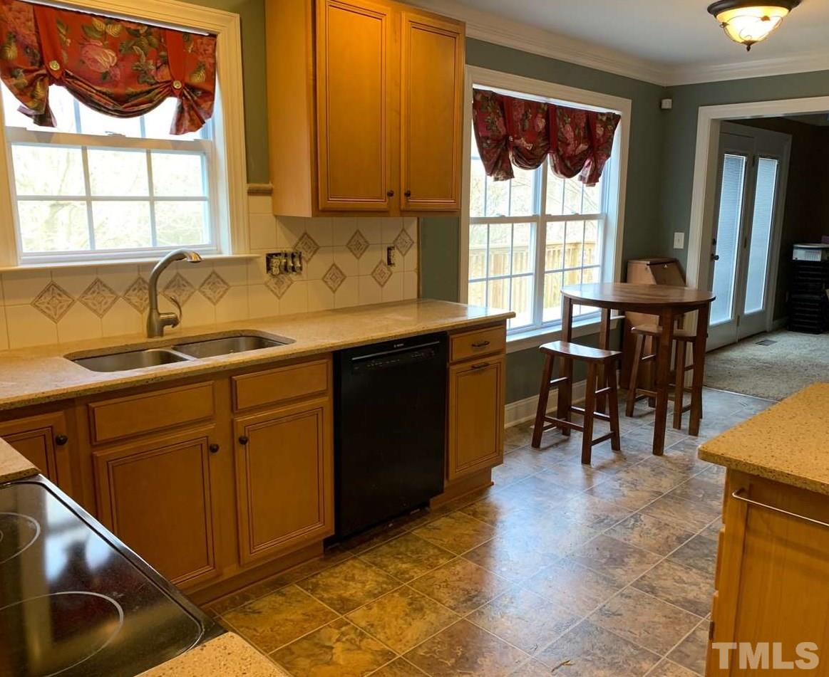 901 Ledgerock Road Wake Forest, NC 27587 - Photo 5 of 23 Updated kitchen w/ solid surface Silestone countertops