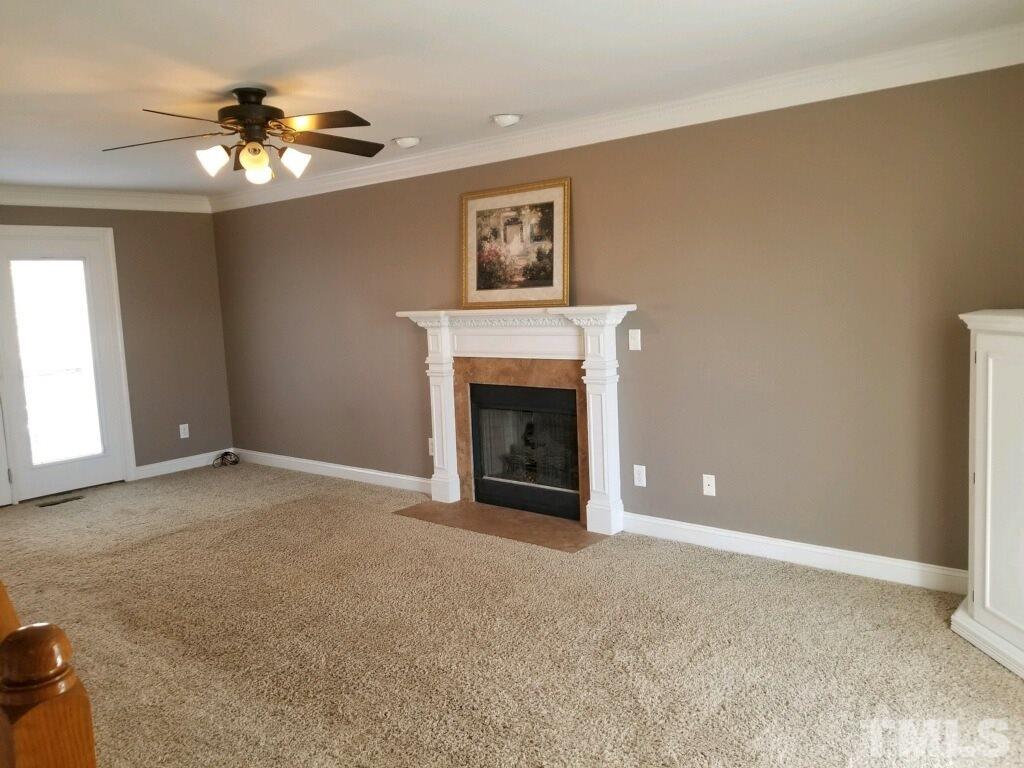 901 Ledgerock Road Wake Forest, NC 27587 - Photo 6 of 23 Large family room w/ great natural light