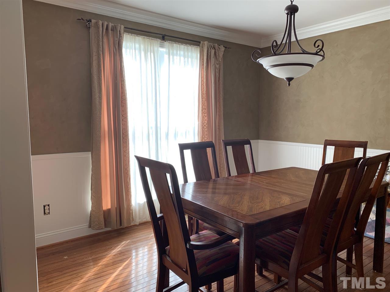 901 Ledgerock Road Wake Forest, NC 27587 - Photo 8 of 23 Separate dining room w/ custom trim