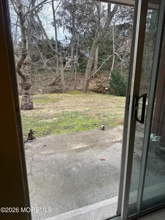 a view of a yard from a window