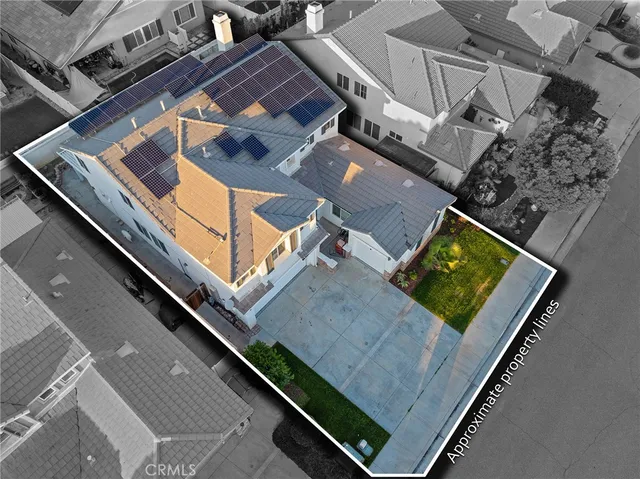 an aerial view of a building with a street