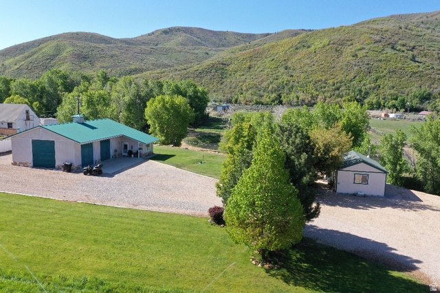 1454 East Little Sweden Road Heber City, UT 84032 - Photo 1 of 35 Aerial view of property and surrounding area with a mountain backdrop