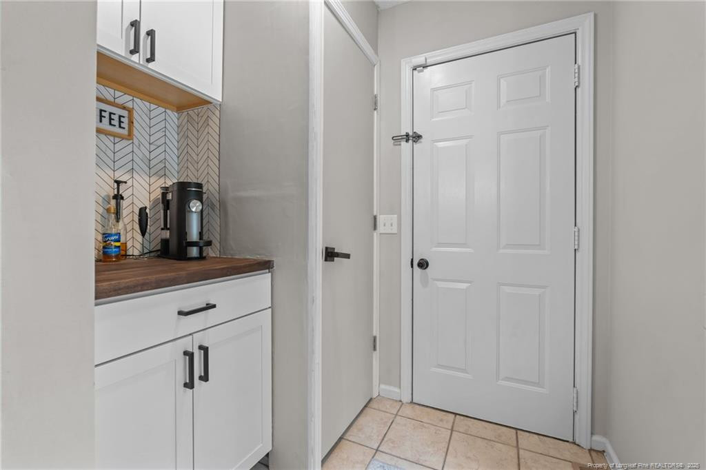 76 North Hillside Drive Spring Lake, NC 28390 - Photo 13 of 50 a view of bathroom with a mirror