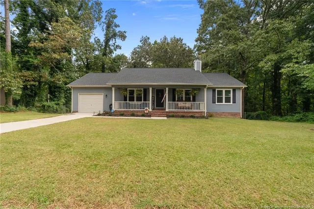 a front view of a house with swimming pool