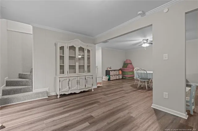 a view of livingroom with furniture and wooden floor