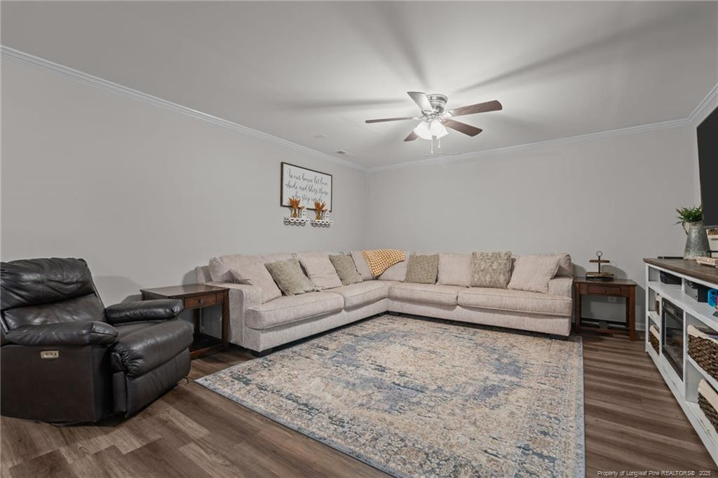 76 North Hillside Drive Spring Lake, NC 28390 - Photo 32 of 50 a living room with furniture and a rug