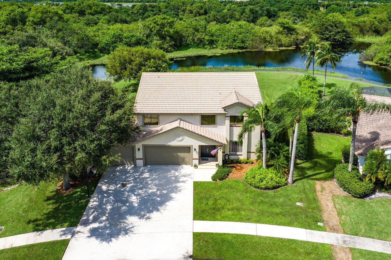 11842 Island Lakes Lane Boca Raton, FL 33498 - Photo 45 of 49 a view of a house with a yard