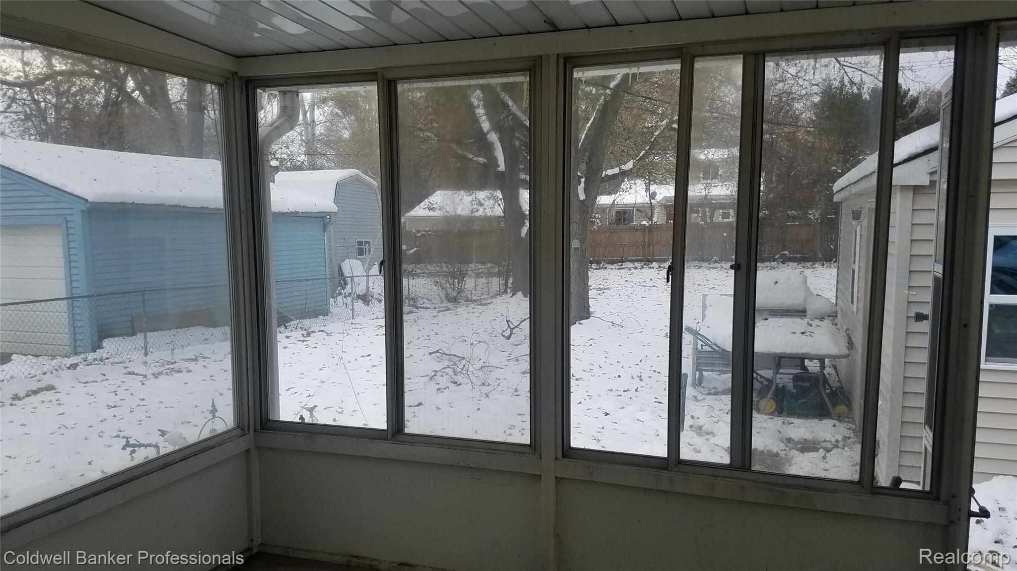 5307 Drayton Road Clarkston, MI 48346 - Photo 15 of 30 5307 Drayton_Enclosed porch overlooks backyard