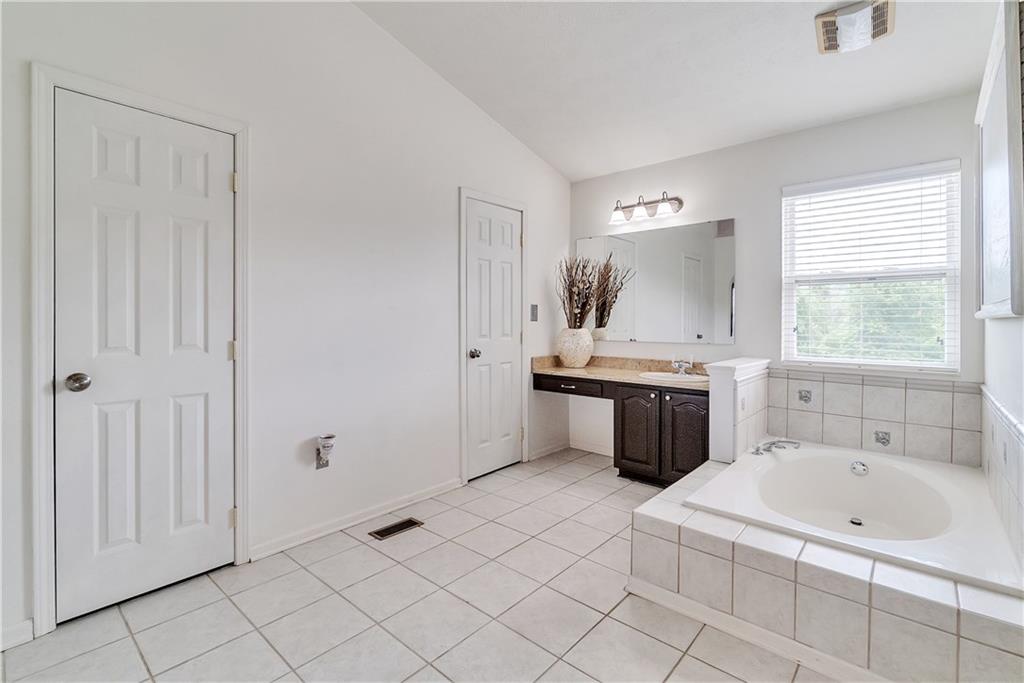 690 Gamble Road Oakdale, PA 15071 - Photo 14 of 24 Spa-like master bathroom with luxurious soaking tub - ahhhhh! Two walk-in closets.