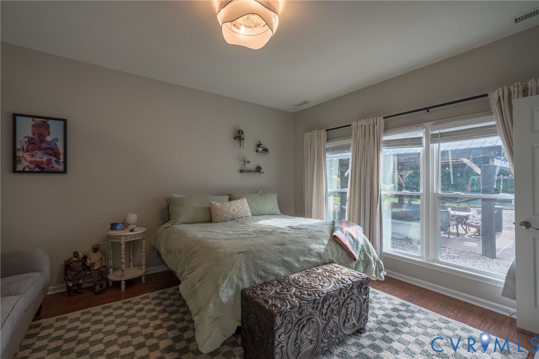 12700 Coalboro Road Chesterfield, VA 23838 - Photo 23 of 50 Room featuring wood-finish flooring and light gray