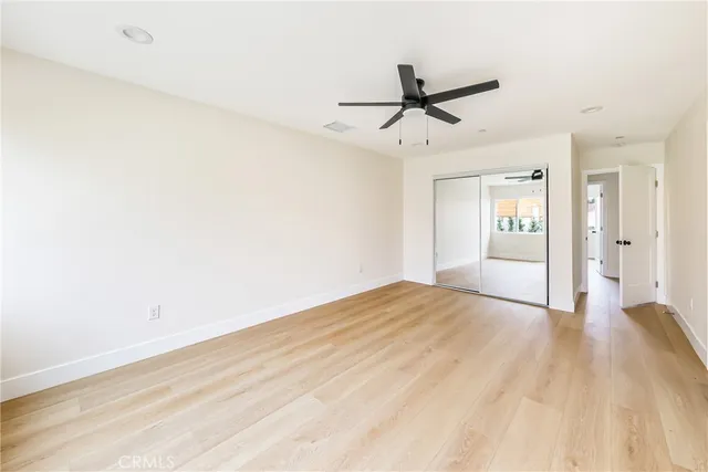 a view of an empty walk in closet