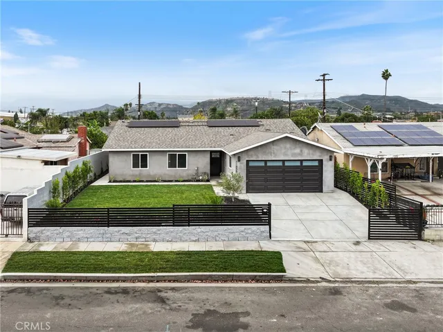 an aerial view of residential houses with city view and wooden floor