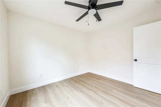 front view of a building with a garden