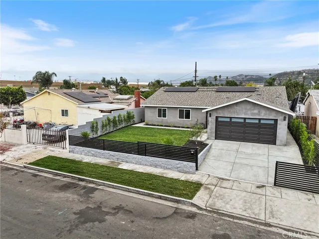 a house view with a backyard space