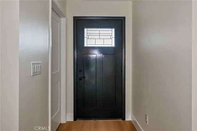 a bathroom with a sink a mirror and shower