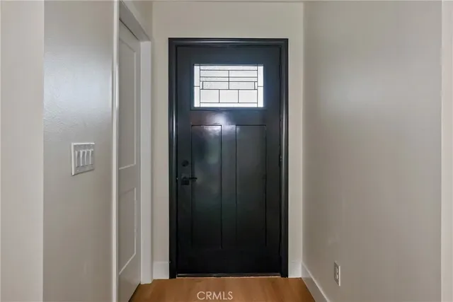 a kitchen with stainless steel appliances white cabinets and a stove