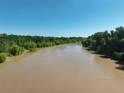 a view of a lake with mountain in the background