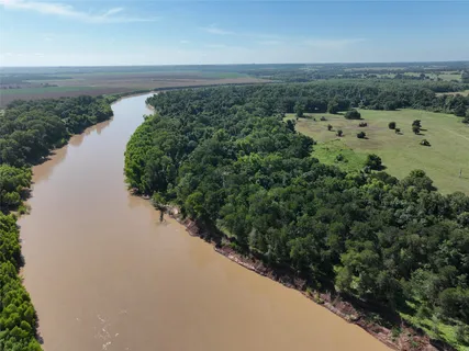 a view of a lake with a city
