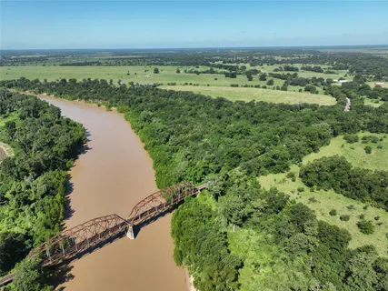 an aerial view of beach and ocean