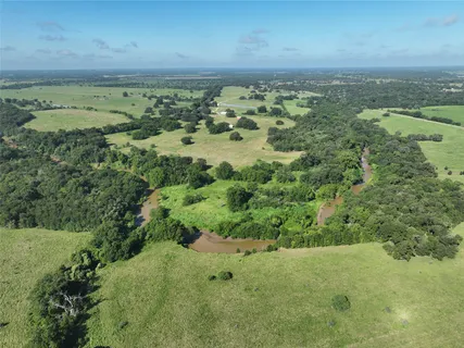 a view of a yard with an outdoor space