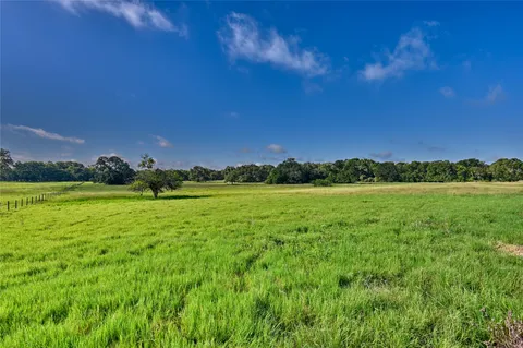 a view of a lake with a city