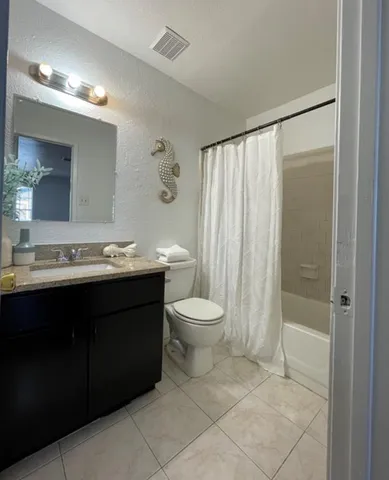 a view of a house with a patio