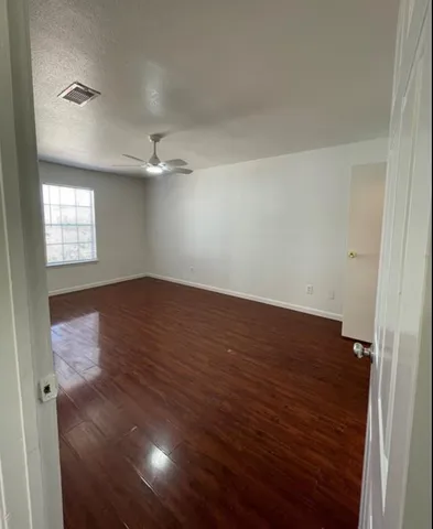 a view of a house with a street