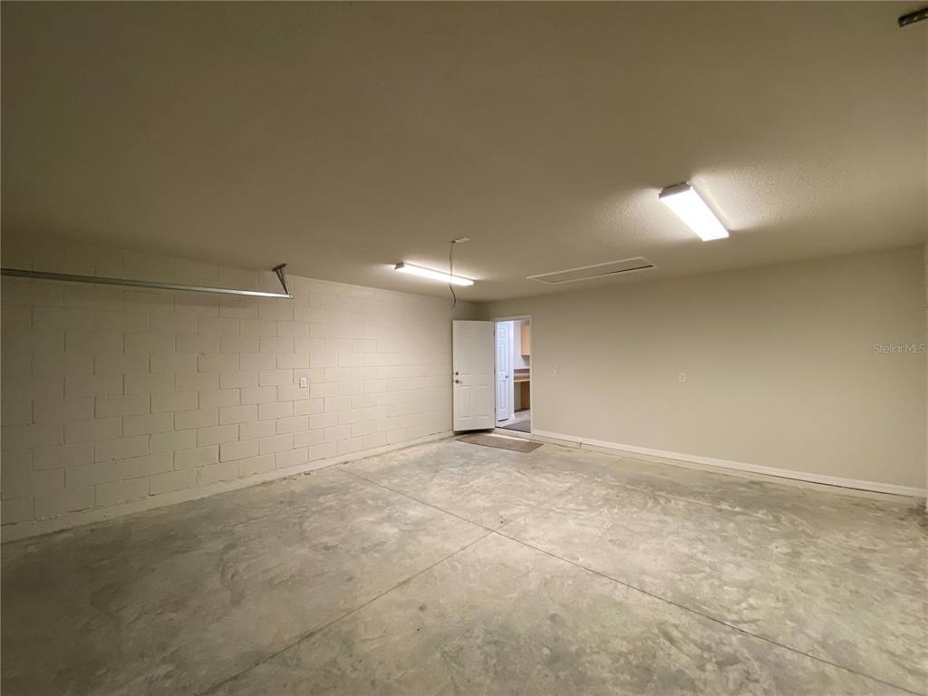 16090 Southwest 55th Avenue Road Ocala, FL 34473 - Photo 22 of 28 an empty room with a empty space and a window