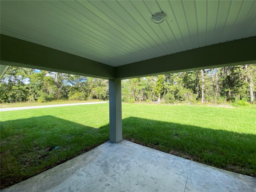 16090 Southwest 55th Avenue Road Ocala, FL 34473 - Photo 24 of 28 a big room with yard and outdoor space