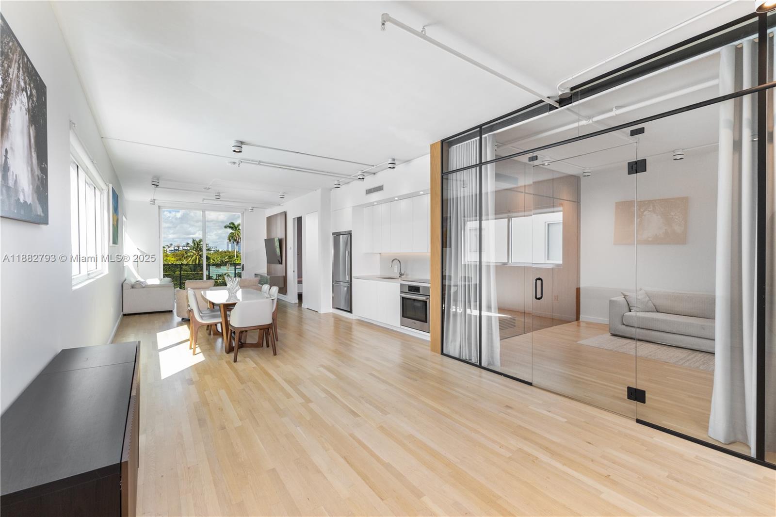 a living room with furniture and a table