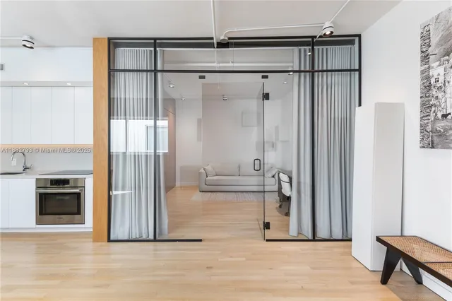 a view of a bathroom with a tub and shower