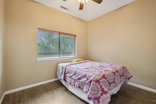 a bedroom with a bed and a walk in closet