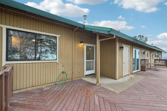 a view of balcony and wooden floor