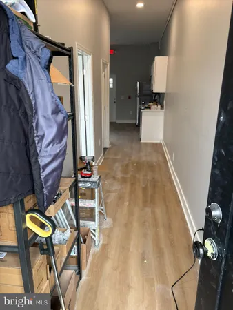 a view of entryway and kitchen
