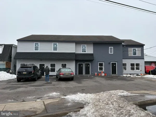 a car parked in front of a building