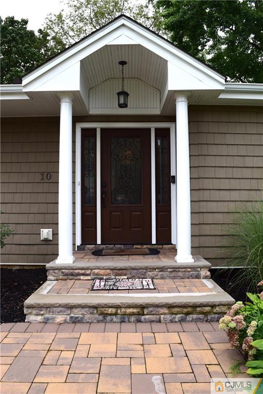 10 Fordham Road Old Bridge, NJ 08859 - Photo 2 of 26 a front view of a house with a yard