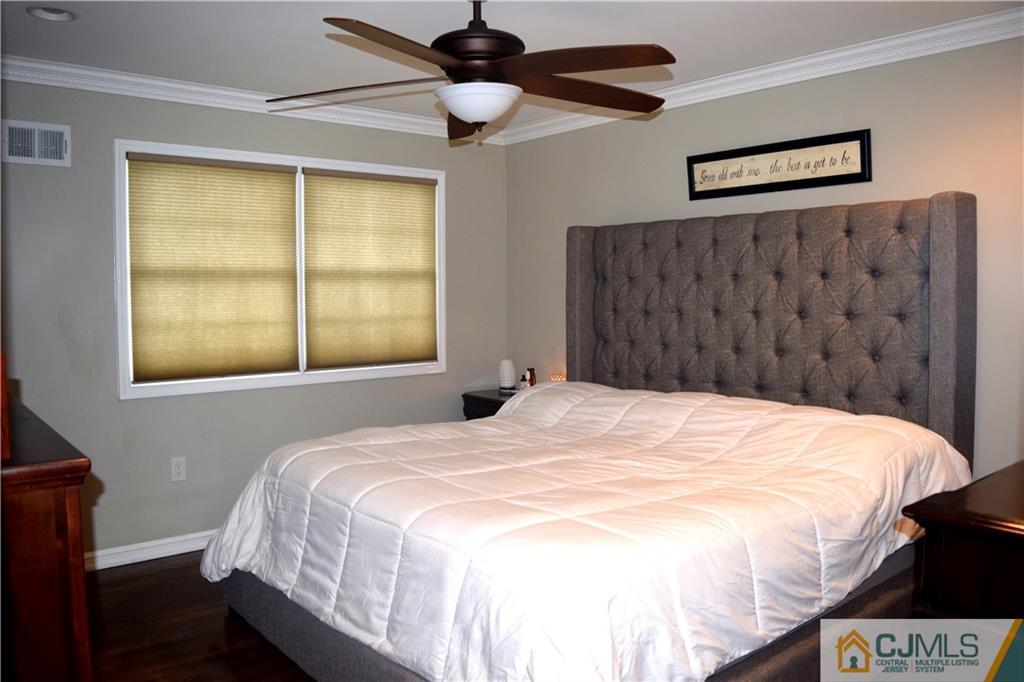 10 Fordham Road Old Bridge, NJ 08859 - Photo 12 of 26 a bedroom with a bed and a window
