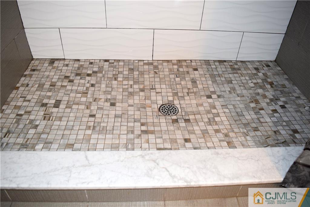 10 Fordham Road Old Bridge, NJ 08859 - Photo 19 of 26 a bathroom with a bathtub