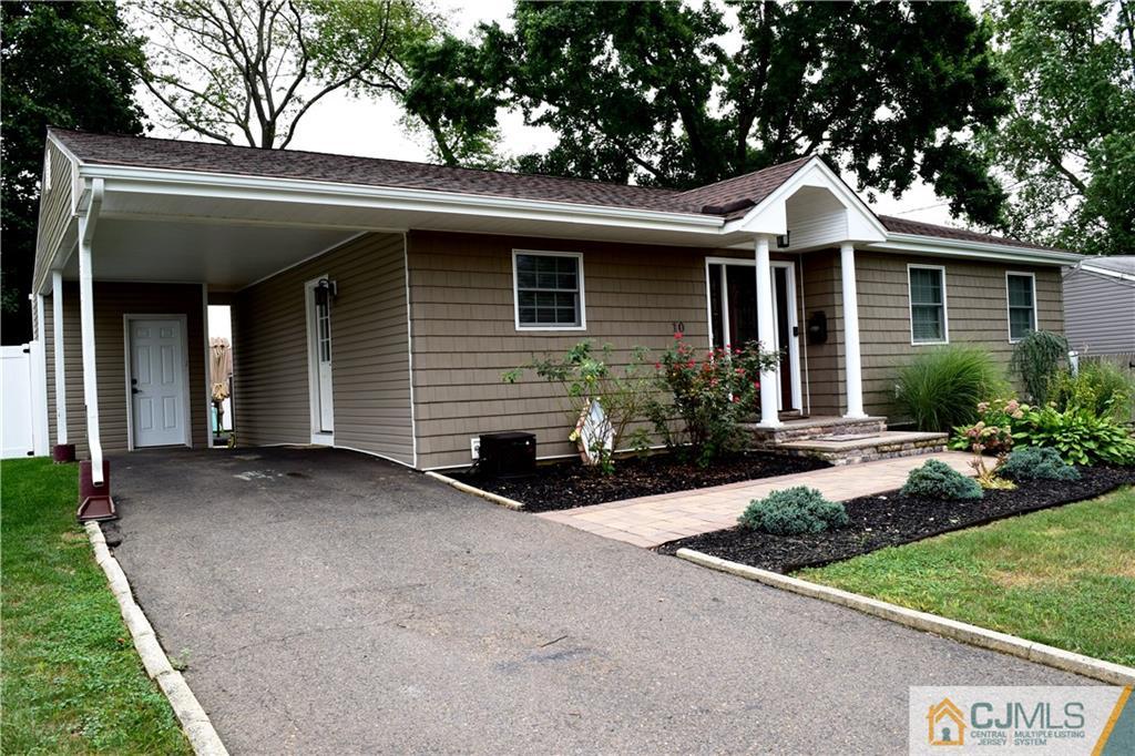 10 Fordham Road Old Bridge, NJ 08859 - Photo 25 of 26 a front view of a house with yard and green space