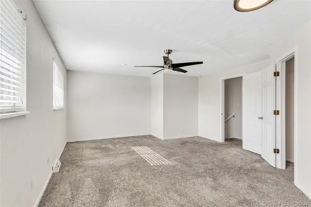 a view of empty room with windows