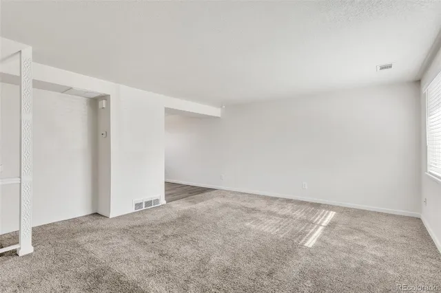 an empty room with an entryway