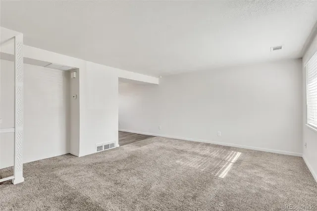 an empty room with an entryway