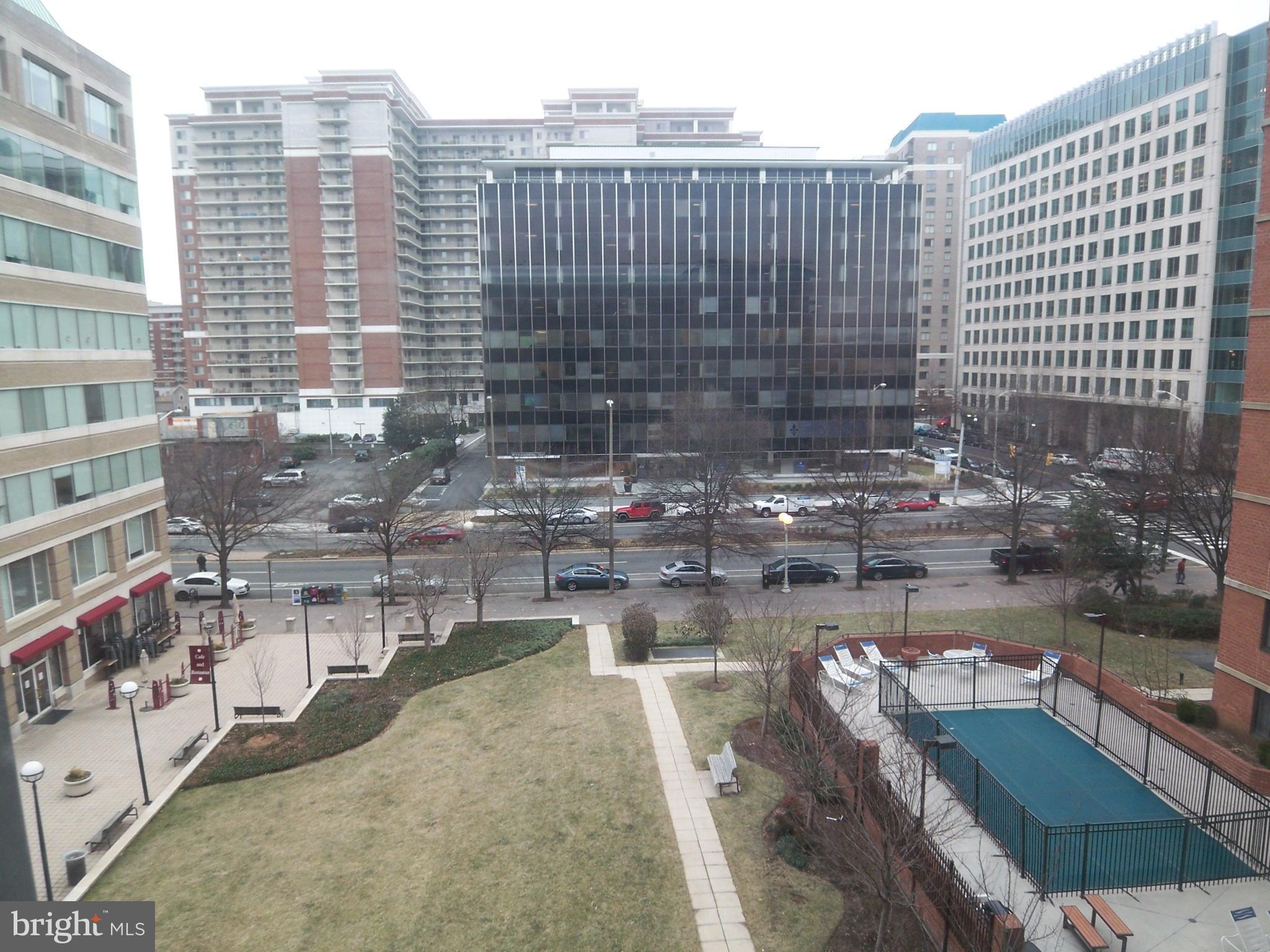 1001 North Randolph Street, Unit 516 Arlington, VA 22201 - Photo 15 of 18 a view of a city with tall buildings