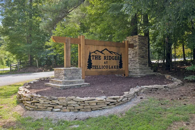 a sign board with parking space