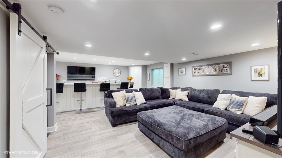 25613 West Cerena Circle Plainfield, IL 60586 - Photo 19 of 28 a living room with furniture and view of kitchen