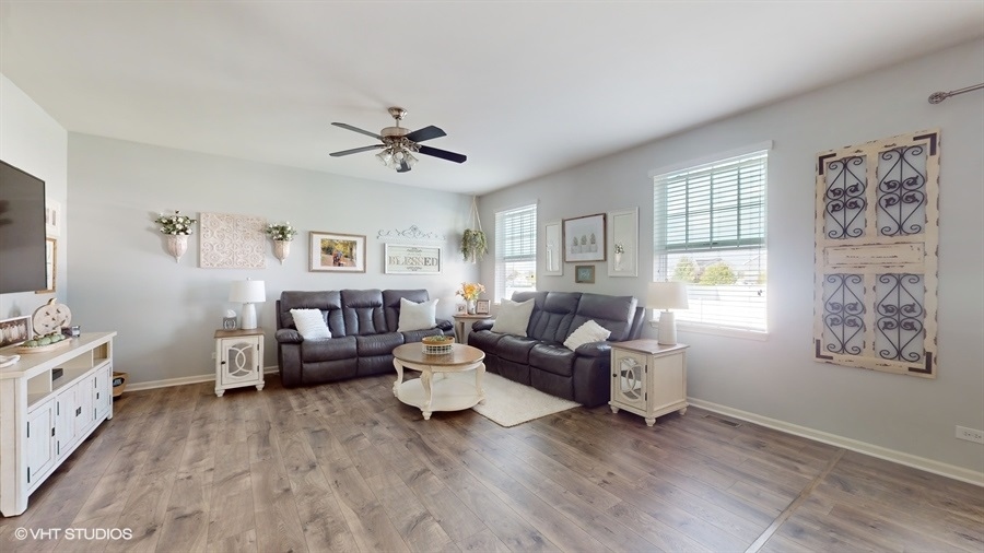 25613 West Cerena Circle Plainfield, IL 60586 - Photo 2 of 28 a living room with furniture and wooden floor
