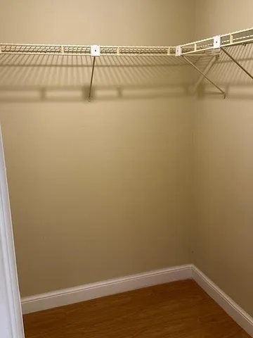 a view of a room with racks on the wall