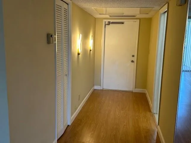 a view of a bathroom with a glass door