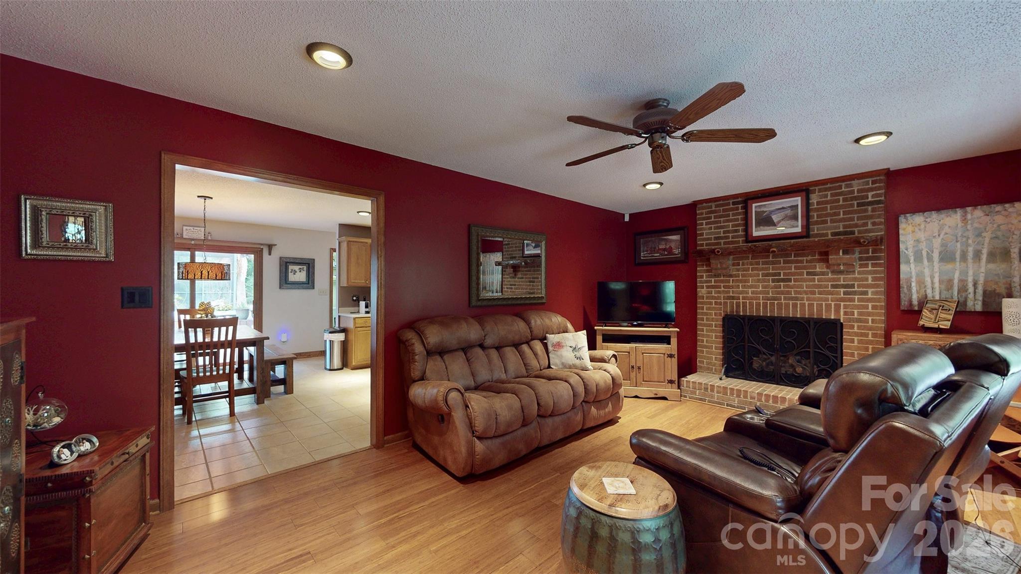 8720 Unionville-Brief Road Monroe, NC 28110 - Photo 21 of 35 a living room with furniture and a fireplace